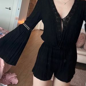 Black romper with lace detailing